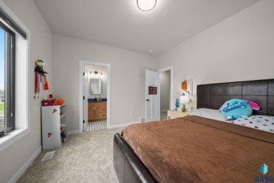 Experience luxury living in this beautiful two-story walkout on Willow Run Golf Course in South Dakota - for sale on GolfHomes.com, golf home, golf lot