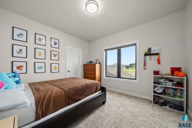 Experience luxury living in this beautiful two-story walkout on Willow Run Golf Course in South Dakota - for sale on GolfHomes.com, golf home, golf lot