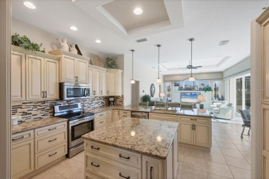 Under contract-accepting backup offers. This MAGNIFICENT home is on Pelican Pointe Golf and Country Club in Florida - for sale on GolfHomes.com, golf home, golf lot