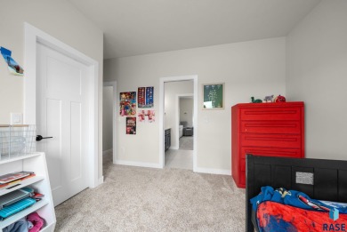 Experience luxury living in this beautiful two-story walkout on Willow Run Golf Course in South Dakota - for sale on GolfHomes.com, golf home, golf lot
