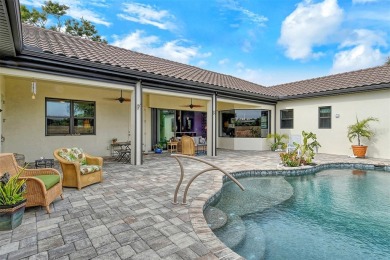 This custom-built island home represents Florida living at its on Lake Venice Golf Club in Florida - for sale on GolfHomes.com, golf home, golf lot