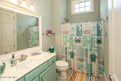 Gorgeous custom home built by award winning Carrell Homes.  This on Ocean Ridge Plantation in North Carolina - for sale on GolfHomes.com, golf home, golf lot