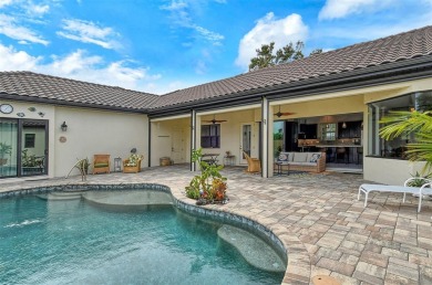 This custom-built island home represents Florida living at its on Lake Venice Golf Club in Florida - for sale on GolfHomes.com, golf home, golf lot