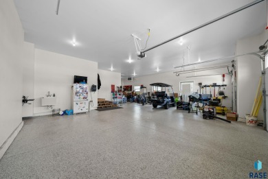 Experience luxury living in this beautiful two-story walkout on Willow Run Golf Course in South Dakota - for sale on GolfHomes.com, golf home, golf lot