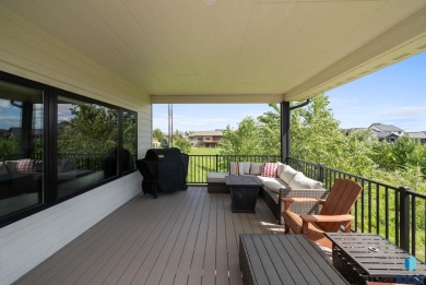 Experience luxury living in this beautiful two-story walkout on Willow Run Golf Course in South Dakota - for sale on GolfHomes.com, golf home, golf lot