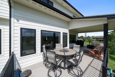 Experience luxury living in this beautiful two-story walkout on Willow Run Golf Course in South Dakota - for sale on GolfHomes.com, golf home, golf lot