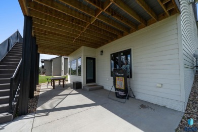 Experience luxury living in this beautiful two-story walkout on Willow Run Golf Course in South Dakota - for sale on GolfHomes.com, golf home, golf lot