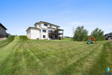 Experience luxury living in this beautiful two-story walkout on Willow Run Golf Course in South Dakota - for sale on GolfHomes.com, golf home, golf lot