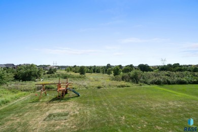 Experience luxury living in this beautiful two-story walkout on Willow Run Golf Course in South Dakota - for sale on GolfHomes.com, golf home, golf lot
