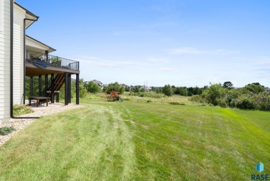 Experience luxury living in this beautiful two-story walkout on Willow Run Golf Course in South Dakota - for sale on GolfHomes.com, golf home, golf lot