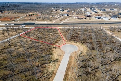 Located directly on the runway in the exclusive aviation on Pecan Plantation Country Club in Texas - for sale on GolfHomes.com, golf home, golf lot