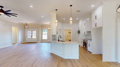 Located in an upscale cul-de-sac, this elegant home sits on a on Persimmon Ridge Golf Club in Arkansas - for sale on GolfHomes.com, golf home, golf lot