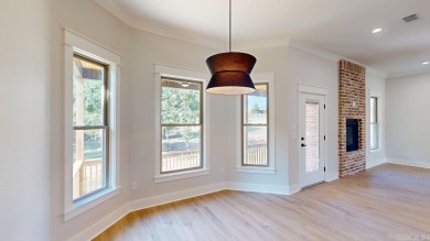 Located in an upscale cul-de-sac, this elegant home sits on a on Persimmon Ridge Golf Club in Arkansas - for sale on GolfHomes.com, golf home, golf lot