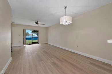 RENOVATED: new flooring, new kitchen and bathroom cabinetry on Golden Gate Country Club in Florida - for sale on GolfHomes.com, golf home, golf lot