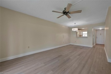 RENOVATED: new flooring, new kitchen and bathroom cabinetry on Golden Gate Country Club in Florida - for sale on GolfHomes.com, golf home, golf lot