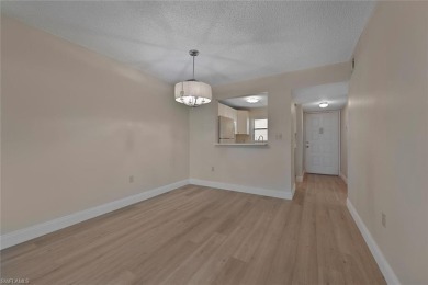 RENOVATED: new flooring, new kitchen and bathroom cabinetry on Golden Gate Country Club in Florida - for sale on GolfHomes.com, golf home, golf lot