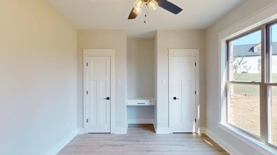 Located in an upscale cul-de-sac, this elegant home sits on a on Persimmon Ridge Golf Club in Arkansas - for sale on GolfHomes.com, golf home, golf lot