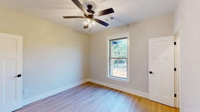 Located in an upscale cul-de-sac, this elegant home sits on a on Persimmon Ridge Golf Club in Arkansas - for sale on GolfHomes.com, golf home, golf lot