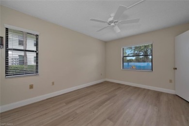 RENOVATED: new flooring, new kitchen and bathroom cabinetry on Golden Gate Country Club in Florida - for sale on GolfHomes.com, golf home, golf lot