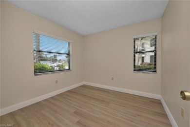 RENOVATED: new flooring, new kitchen and bathroom cabinetry on Golden Gate Country Club in Florida - for sale on GolfHomes.com, golf home, golf lot