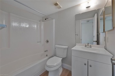 RENOVATED: new flooring, new kitchen and bathroom cabinetry on Golden Gate Country Club in Florida - for sale on GolfHomes.com, golf home, golf lot