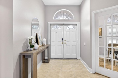 Situated on a rare 10,000+ sq ft lot in Westchase, this heated on Westchase Golf Club in Florida - for sale on GolfHomes.com, golf home, golf lot