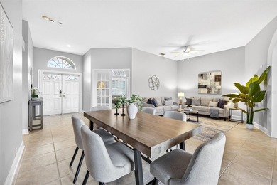 Situated on a rare 10,000+ sq ft lot in Westchase, this heated on Westchase Golf Club in Florida - for sale on GolfHomes.com, golf home, golf lot