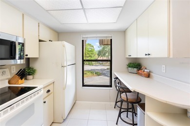 Beautiful Golf & Lake View Condo in The Meadows - Turnkey and on The Meadows Golf and Country Club in Florida - for sale on GolfHomes.com, golf home, golf lot