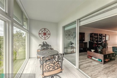 AN ABSOLUTE MUST SEE!! TOTALLY REMODELED PENTHOUSE UNIT. NEW CGI on Wynmoor Golf Course in Florida - for sale on GolfHomes.com, golf home, golf lot