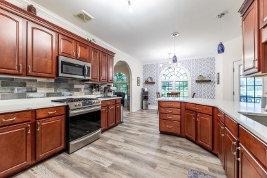 A beautiful brick, ranch, golf course home has many updates and on Santee-Cooper Country Club in South Carolina - for sale on GolfHomes.com, golf home, golf lot