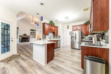 A beautiful brick, ranch, golf course home has many updates and on Santee-Cooper Country Club in South Carolina - for sale on GolfHomes.com, golf home, golf lot
