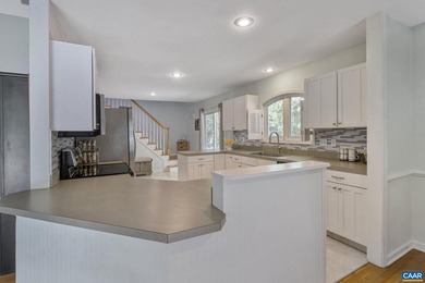 Enjoy the ease of one-level living in this inviting golf-front on Lake Monticello Golf Course in Virginia - for sale on GolfHomes.com, golf home, golf lot