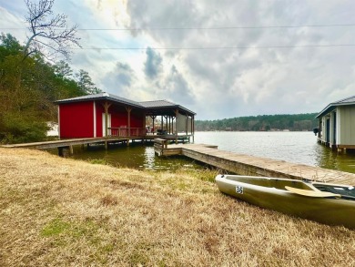 Tranquil 1.5 bedroom and 1 full bath cabin that sits on on Pine Dunes Golf Course in Texas - for sale on GolfHomes.com, golf home, golf lot