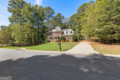 Welcome to this beautiful brick-front home located in one of on Whitewater Creek in Georgia - for sale on GolfHomes.com, golf home, golf lot