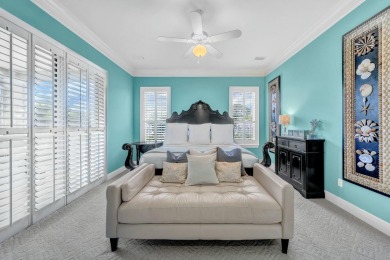 Experience coastal luxury at Sunshine Retreat nestled in the on Regatta Bay Golf and Country Club in Florida - for sale on GolfHomes.com, golf home, golf lot