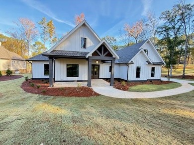 Perfectly sized with every upscale finish, this new home on Harbor Club Golf and Country Club in Georgia - for sale on GolfHomes.com, golf home, golf lot