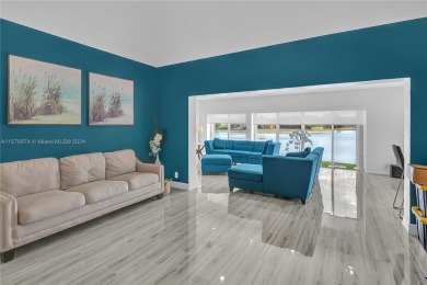 Welcome to your fully remodeled lake waterfront haven! This on Woodlands Country Club in Florida - for sale on GolfHomes.com, golf home, golf lot