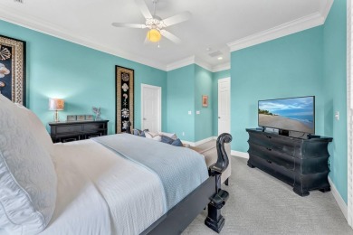 Experience coastal luxury at Sunshine Retreat nestled in the on Regatta Bay Golf and Country Club in Florida - for sale on GolfHomes.com, golf home, golf lot