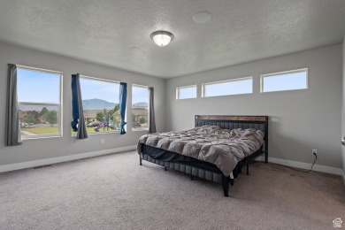 This spacious 4 bed, 3.5 bath home in the heart of Eagle on Cedar Hills Golf Club in Utah - for sale on GolfHomes.com, golf home, golf lot