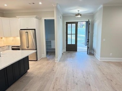 Perfectly sized with every upscale finish, this new home on Harbor Club Golf and Country Club in Georgia - for sale on GolfHomes.com, golf home, golf lot