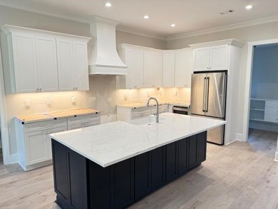 Perfectly sized with every upscale finish, this new home on Harbor Club Golf and Country Club in Georgia - for sale on GolfHomes.com, golf home, golf lot