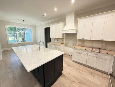 Perfectly sized with every upscale finish, this new home on Harbor Club Golf and Country Club in Georgia - for sale on GolfHomes.com, golf home, golf lot