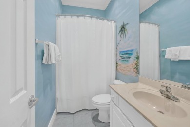 Experience coastal luxury at Sunshine Retreat nestled in the on Regatta Bay Golf and Country Club in Florida - for sale on GolfHomes.com, golf home, golf lot