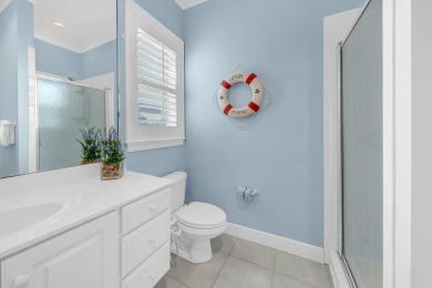 Experience coastal luxury at Sunshine Retreat nestled in the on Regatta Bay Golf and Country Club in Florida - for sale on GolfHomes.com, golf home, golf lot