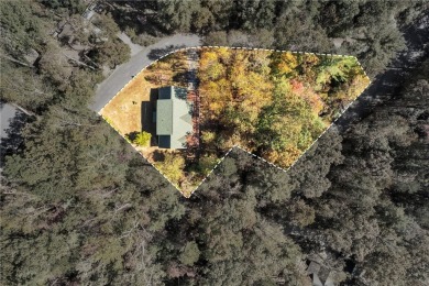 Welcome home to your new cabin nestled among trees backing up to on The Rock At Jocassee in South Carolina - for sale on GolfHomes.com, golf home, golf lot