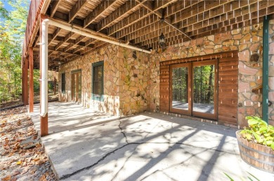 Welcome home to your new cabin nestled among trees backing up to on The Rock At Jocassee in South Carolina - for sale on GolfHomes.com, golf home, golf lot