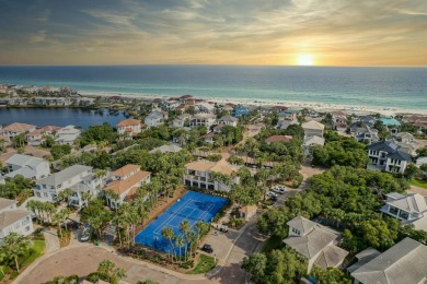 Experience coastal luxury at Sunshine Retreat nestled in the on Regatta Bay Golf and Country Club in Florida - for sale on GolfHomes.com, golf home, golf lot