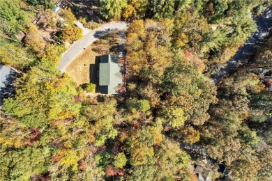Welcome home to your new cabin nestled among trees backing up to on The Rock At Jocassee in South Carolina - for sale on GolfHomes.com, golf home, golf lot