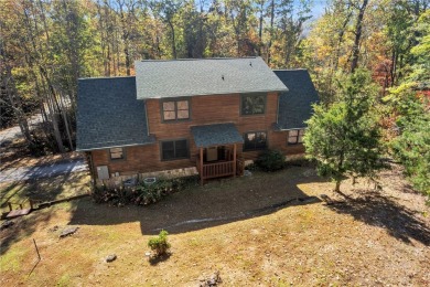 Welcome home to your new cabin nestled among trees backing up to on The Rock At Jocassee in South Carolina - for sale on GolfHomes.com, golf home, golf lot