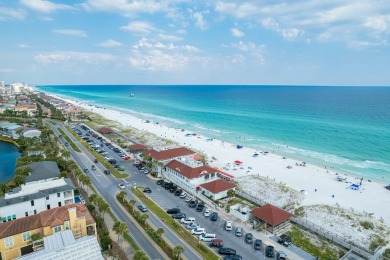Experience coastal luxury at Sunshine Retreat nestled in the on Regatta Bay Golf and Country Club in Florida - for sale on GolfHomes.com, golf home, golf lot
